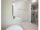 Bright bathroom showcasing double vanity and updated glass shower at 2863 Landing Dr, Marietta, GA 30066