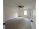 Neutral bedroom with a ceiling fan, a light gray carpet, and one window at 2863 Landing Dr, Marietta, GA 30066