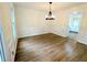 Formal dining room showcasing updated floors and natural light at 2863 Landing Dr, Marietta, GA 30066