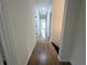 Hallway with hardwood floors and white doors at 2863 Landing Dr, Marietta, GA 30066