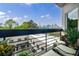 Balcony view overlooking the city skyline and lush greenery, perfect for relaxation at 587 Virginia Ne Ave # 314, Atlanta, GA 30306