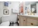 A modern bathroom features a floating vanity, updated fixtures, and a glass-enclosed shower at 587 Virginia Ne Ave # 314, Atlanta, GA 30306
