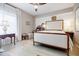 A bright bedroom features hardwood floors, a cozy reading nook, and a comfortable bed at 587 Virginia Ne Ave # 314, Atlanta, GA 30306