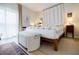 Bright bedroom featuring comfortable bed with wooden frame and soft decor at 587 Virginia Ne Ave # 314, Atlanta, GA 30306