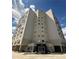 Exterior shot of a modern apartment building with floor-to-ceiling glass and many windows at 587 Virginia Ne Ave # 314, Atlanta, GA 30306