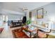 Stylish living room featuring a cozy sofa, coffee table with books, and loft at 587 Virginia Ne Ave # 314, Atlanta, GA 30306