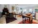 Bright living room featuring hardwood floors, a dining area, and large windows with lots of natural light at 587 Virginia Ne Ave # 314, Atlanta, GA 30306