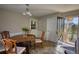 Bright dining area with natural light, traditional furniture, and view to the outside at 610 Loth Wages Rd, Dacula, GA 30019