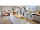 This kitchen features stainless steel appliances, a breakfast bar, and modern finishes at 610 Loth Wages Rd, Dacula, GA 30019