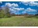 Scenic grassy land under a picturesque sky, perfect for development or enjoying nature's tranquility at 610 Loth Wages Rd, Dacula, GA 30019