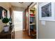 Hallway features a barn door, storage shelves, and access to a bathroom with soaking tub at 1101 Juniper Ne St # 632, Atlanta, GA 30309