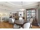 Bright living room with hardwood floors, modern lighting, and comfortable seating at 1101 Juniper Ne St # 632, Atlanta, GA 30309