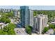 Aerial view of a building featuring city views and lush greenery at 2161 Peachtree Ne Rd # 907, Atlanta, GA 30309