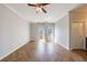 Spacious bedroom featuring herringbone floors, neutral walls, and a ceiling fan at 2161 Peachtree Ne Rd # 907, Atlanta, GA 30309