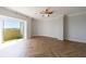 Bright bedroom features herringbone floors and access to a private balcony with great views at 2161 Peachtree Ne Rd # 907, Atlanta, GA 30309