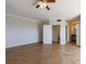 Bedroom features herringbone floors and adjoins the bathroom and closet at 2161 Peachtree Ne Rd # 907, Atlanta, GA 30309