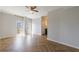 Bright bedroom features herringbone floors and access to a private balcony at 2161 Peachtree Ne Rd # 907, Atlanta, GA 30309