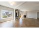 Living room features herringbone floors, large window with city views, and a fireplace at 2161 Peachtree Ne Rd # 907, Atlanta, GA 30309