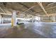 Spacious parking garage with painted support columns and clearly marked spaces at 2161 Peachtree Ne Rd # 907, Atlanta, GA 30309