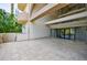 Outdoor patio with tile flooring and access to the building entrance at 2161 Peachtree Ne Rd # 907, Atlanta, GA 30309