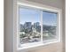 Bright room featuring a large window with views of the surrounding city at 2161 Peachtree Ne Rd # 907, Atlanta, GA 30309