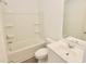 Bathroom featuring a single sink and a shower-tub combination at 4209 Tifton Ln, Sugar Hill, GA 30518