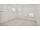 Bright bedroom with three windows, offering ample natural light at 4209 Tifton Ln, Sugar Hill, GA 30518