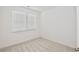 Bright bedroom featuring two windows allowing ample natural light at 4209 Tifton Ln, Sugar Hill, GA 30518