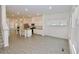 Open-concept kitchen featuring granite countertops, stainless steel appliances, and ample cabinet space at 4209 Tifton Ln, Sugar Hill, GA 30518