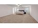 Large bedroom with soft carpet, ceiling fan, and bright windows to let in the morning light at 787 Milo Bay Street, Loganville, GA 30052