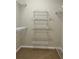 Walk-in closet with shelving to help organize your items at 908 Chippendale Ln, Norcross, GA 30093