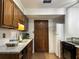 Well-maintained kitchen with granite countertops, wood cabinets, and stainless steel appliances at 908 Chippendale Ln, Norcross, GA 30093
