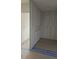 An in-progress bathroom space features a modern design with tiled walls and prepared flooring for a clean, contemporary look at 996 Camilla St, Atlanta, GA 30314