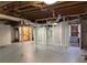 Spacious unfinished basement, offering a blank canvas for customization and added living space at 2112 Fisher Ne Trl, Atlanta, GA 30345