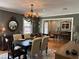 Elegant dining room showcases a stylish chandelier, hardwood floors, and refined decor at 2112 Fisher Ne Trl, Atlanta, GA 30345