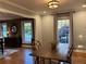 Cozy breakfast nook featuring hardwood floors, large windows, and a serene outdoor view at 2112 Fisher Ne Trl, Atlanta, GA 30345