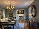 Formal dining room showcasing hardwood floors, crown molding, and elegant chandelier at 2112 Fisher Ne Trl, Atlanta, GA 30345