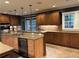 Well-appointed kitchen with granite countertops, ample cabinet space, and modern stainless steel appliances at 2112 Fisher Ne Trl, Atlanta, GA 30345