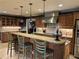 Gourmet kitchen boasts granite countertops, a center island with bar seating, and modern appliances at 2112 Fisher Ne Trl, Atlanta, GA 30345