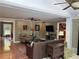 Comfortable living room featuring a ceiling fan, hardwood floors, and a wall-mounted TV at 2112 Fisher Ne Trl, Atlanta, GA 30345