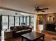Cozy living room with brick fireplace, built-in shelves, and comfortable seating at 2112 Fisher Ne Trl, Atlanta, GA 30345