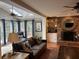 Cozy living room with brick fireplace, built-in shelves, and comfortable seating at 2112 Fisher Ne Trl, Atlanta, GA 30345