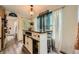 Open concept kitchen with a farmhouse style island, seating, and modern countertops at 24 Laurel Ne Way, White, GA 30184