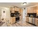 Well-equipped kitchen with stainless steel appliances, granite counters, and updated cabinets at 24 Laurel Ne Way, White, GA 30184