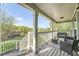 Inviting porch area with comfortable seating and beautiful outdoor views at 24 Laurel Ne Way, White, GA 30184