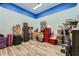Brightly painted storage room with modern flooring and many plastic storage containers at 24 Laurel Ne Way, White, GA 30184