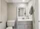 Clean renovated bathroom with updated vanity and framed mirror at 3091 Colonial Way # F2, Atlanta, GA 30341
