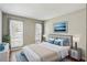 A cozy bedroom bathed in natural light features a comfortable bed and stylish decor at 3091 Colonial Way # F2, Atlanta, GA 30341