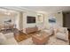 Inviting living room featuring hardwood floors, a neutral color palette, and comfortable seating arrangement at 3091 Colonial Way # F2, Atlanta, GA 30341