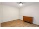 A wood-floored room features a dresser and decorative wall trim at 7275 Oswego Trl, Riverdale, GA 30296